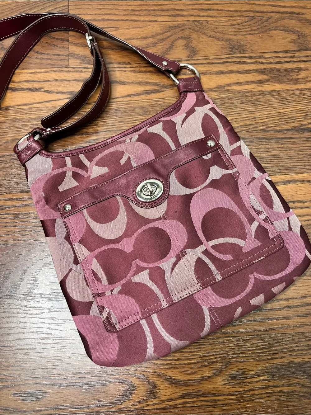 Coach Penelope Optic Signature Hippie Crossbody Bag in a purple/plum color